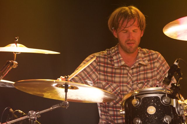 Brooks Wackerman playing drums on stage
