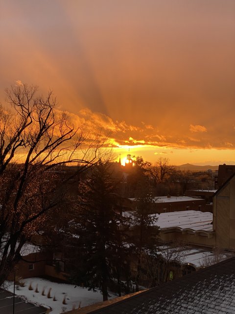 Majestic Sunset Over Snowy Santa Fe