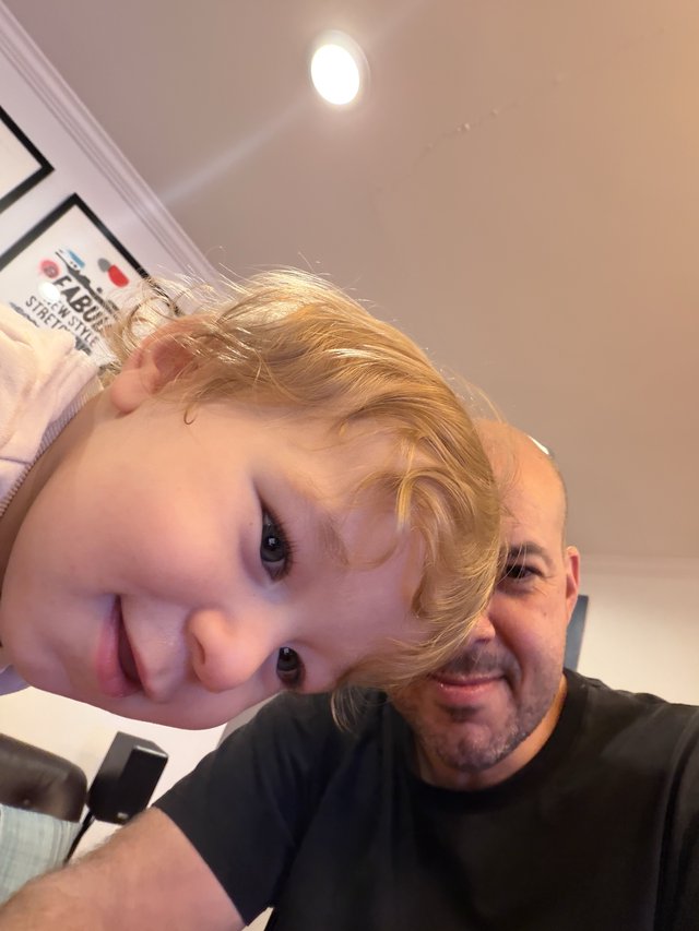 Father and Child Selfie at Home