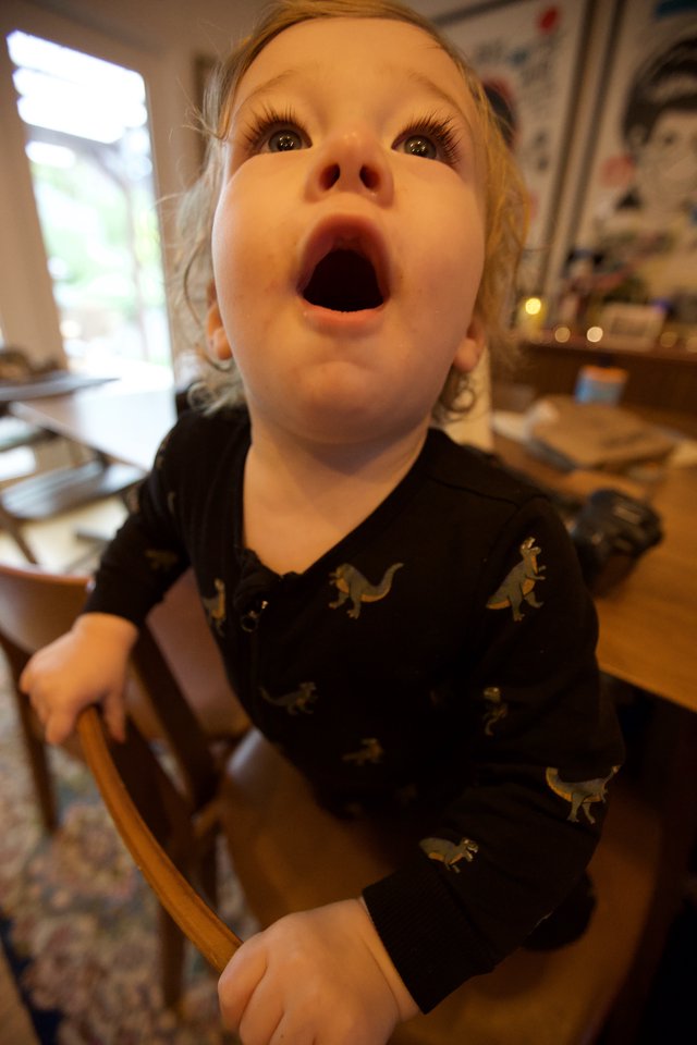 Young Child's Excited Expression on Christmas Day