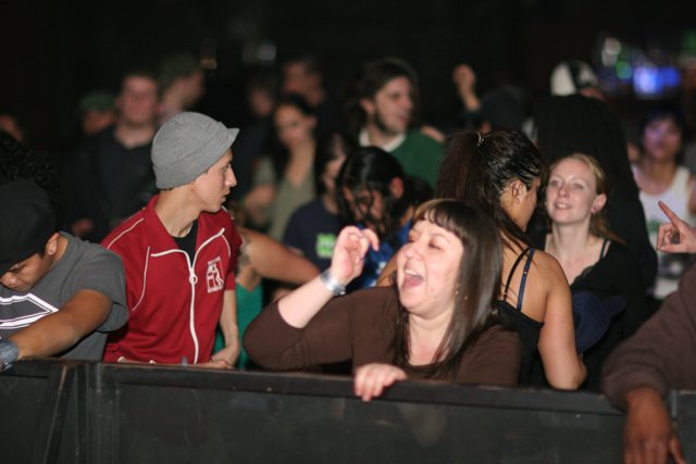 Laughter and Baseball Caps in the Crowd