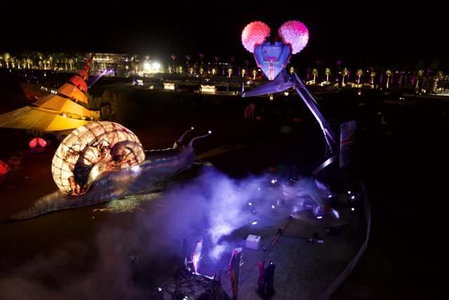 Giant Mouse and Snail Light Up Coachella Night Sky