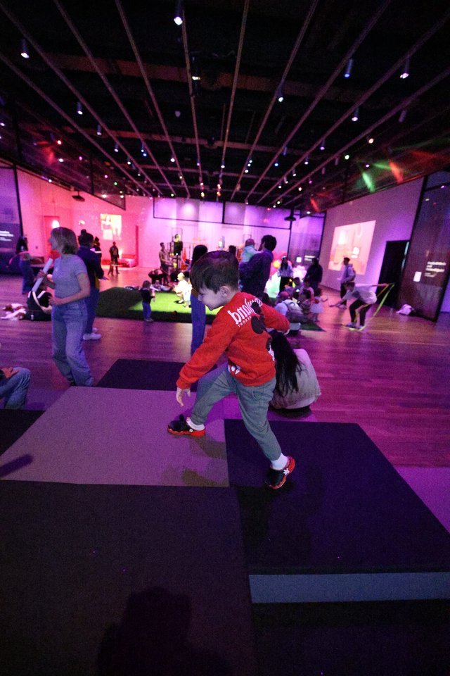 Child Dancing at Baby Rave Interactive Museum Event