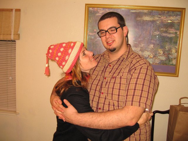Holiday Embrace: Couple Sharing a Joyful Moment