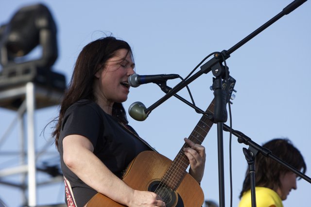 Kim Deal serenades the Coachella crowd with her acoustic guitar