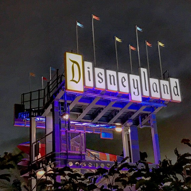 Illuminated Disneyland Entrance at Night