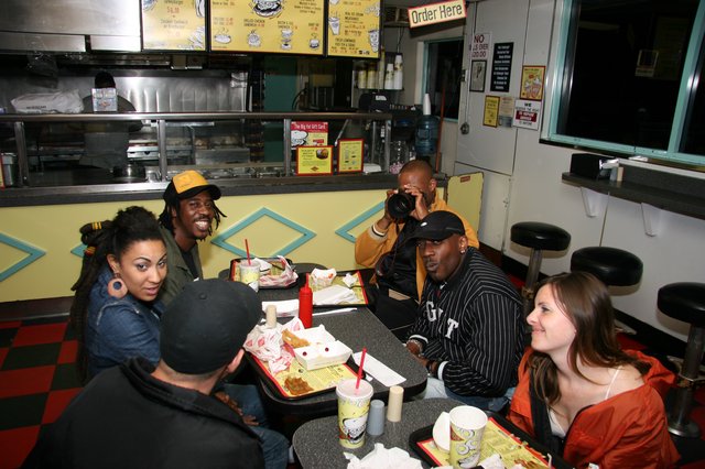 Friends Sharing a Late Night Fast Food Meal