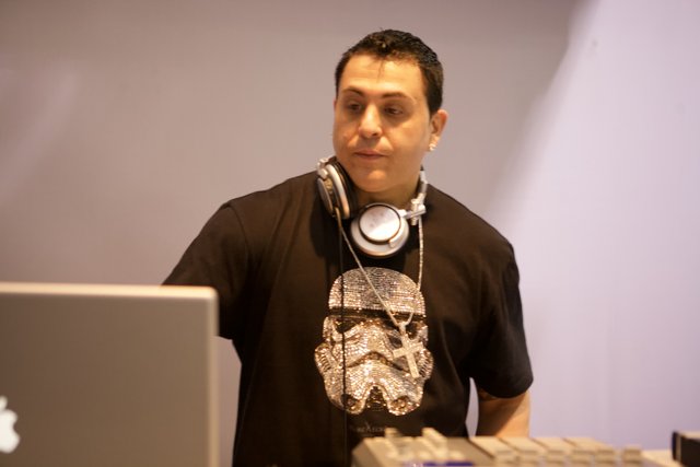 DJ Skribble rocking his Star Wars shirt and headphones