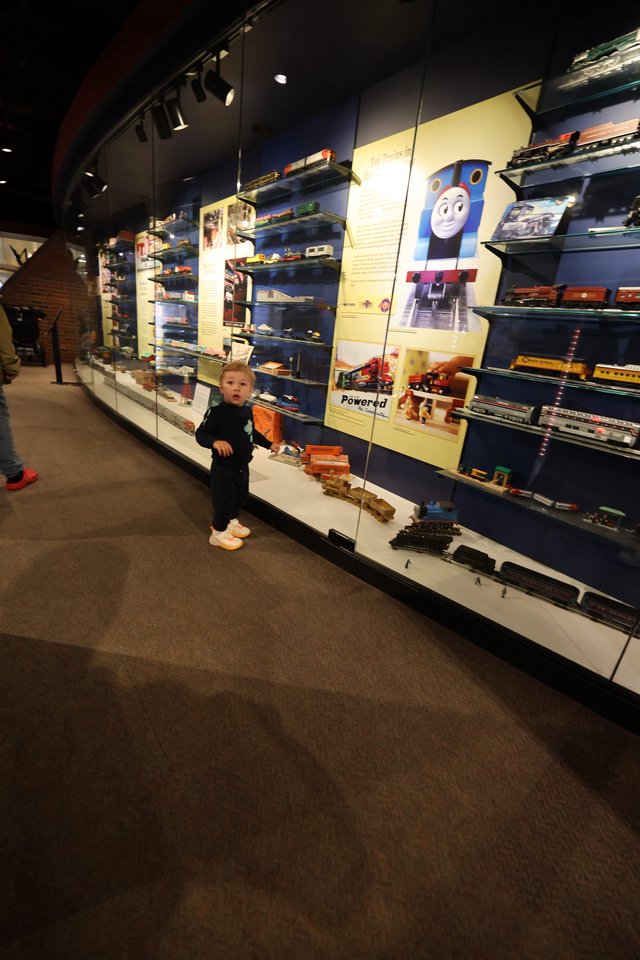 Toddler Exploring Thomas the Tank Engine Train Museum Display