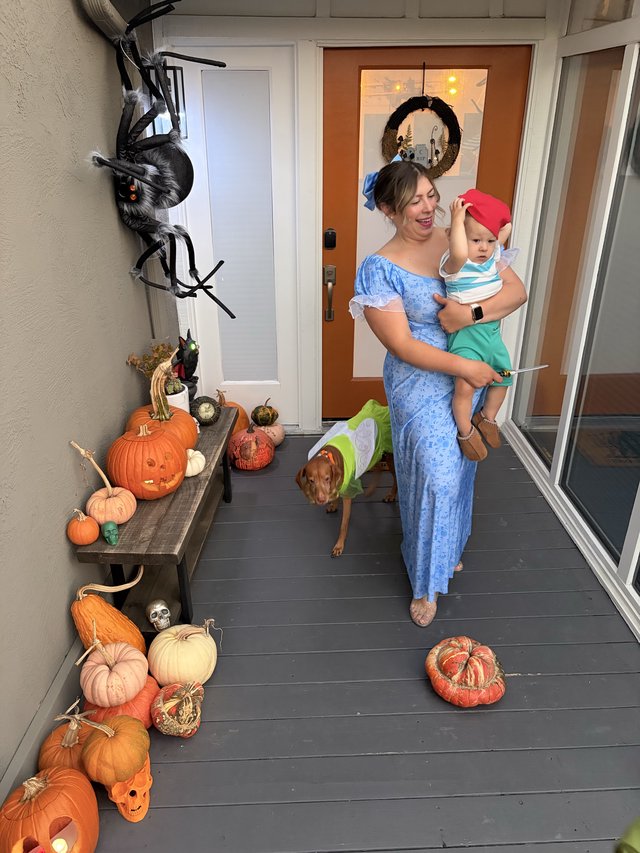 Halloween Porch Welcome with Mom, Baby, and Dog