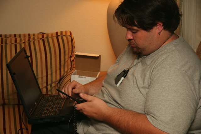 Man on Couch with Laptop