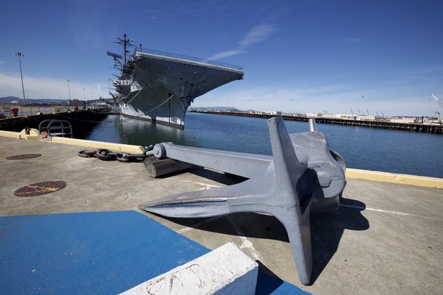 USS Hornet Aircraft Carrier Moored at Naval Dock