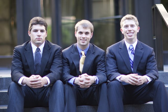 Three Men in Elegant Suits Pose for Flexilis Shoot