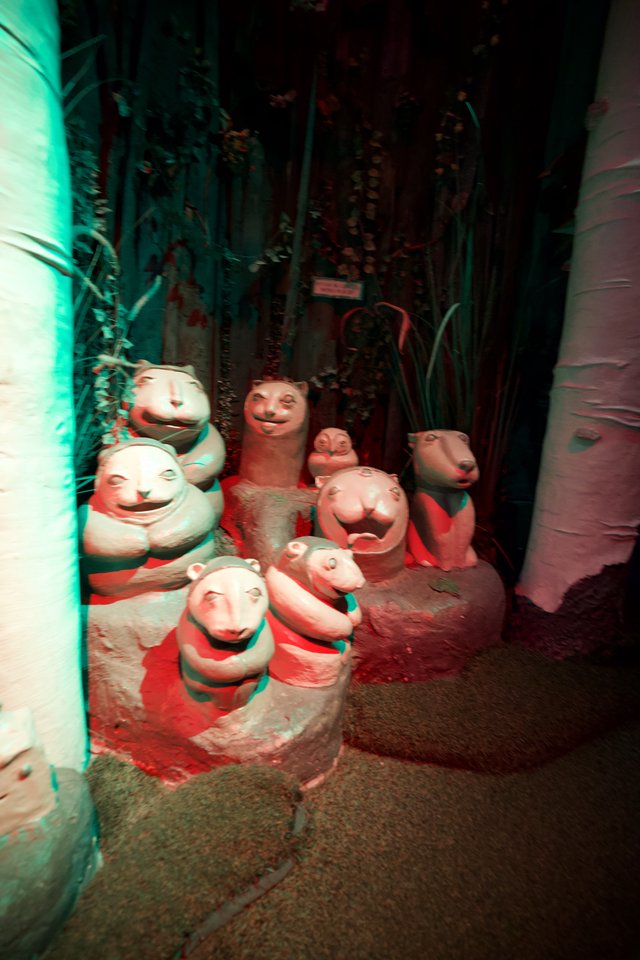 Whimsical Animal Figures in Enchanted Forest Setting