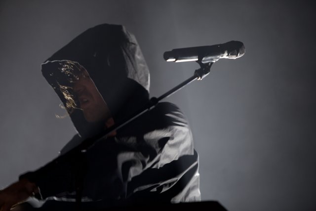 Playing the Keyboard in a Hoodie