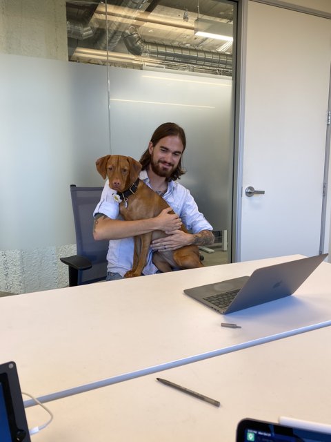 Man and His Canine Companion at Work