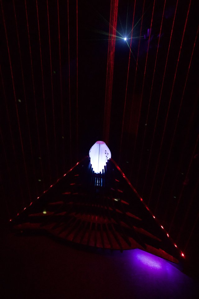 Illuminated Ghost Sculpture in Laser Light Installation