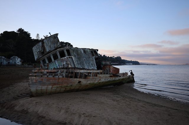 Abandoned Shipwreck at Sunset on California Coast