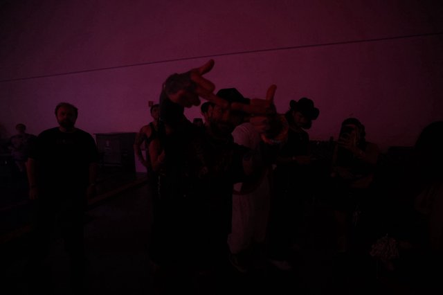 Festival Crowd Energy Under Purple Night Sky