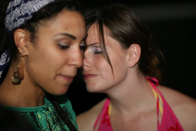 Two Women Share an Intimate Forehead-to-Forehead Moment