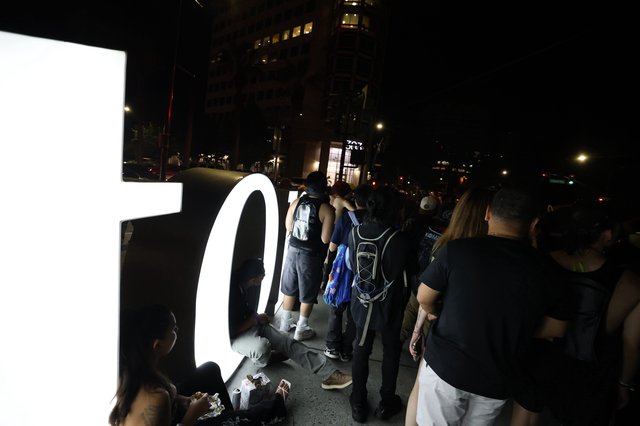 Crowd Gathers Around Glowing Sign at Wobbleland 2026