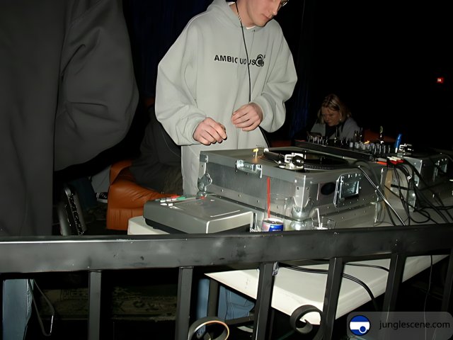 DJing in a Grey Hoodie