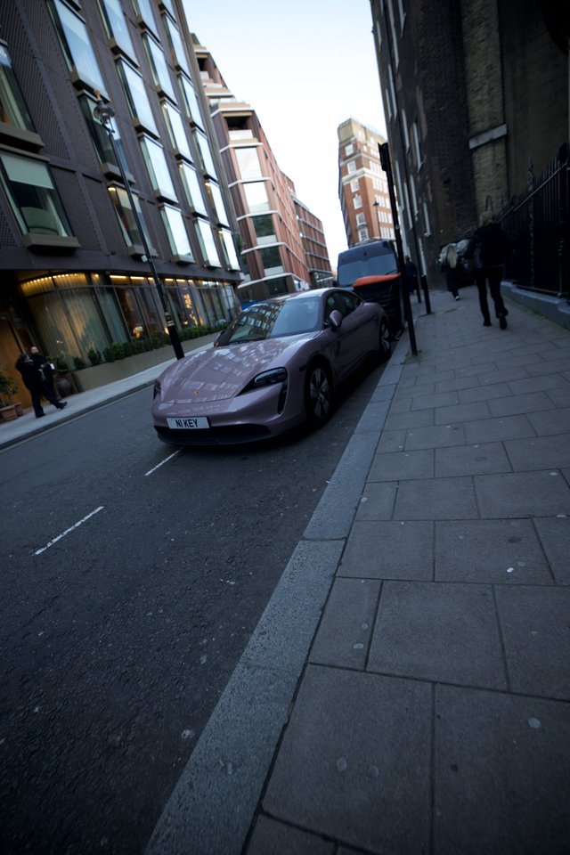 Porsche Taycan Parked on Modern London Street