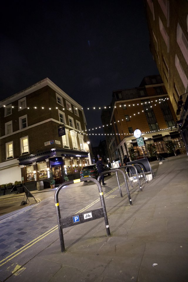 Evening Street Scene with Festive Lights in London