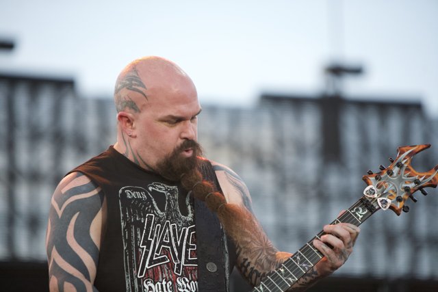 Kerry King Rocking the Stage with His Inked Beard and Electric Guitar