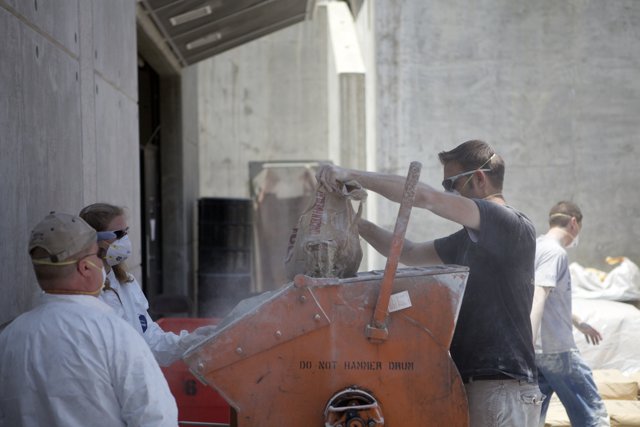 Pouring Cement into the Machine
