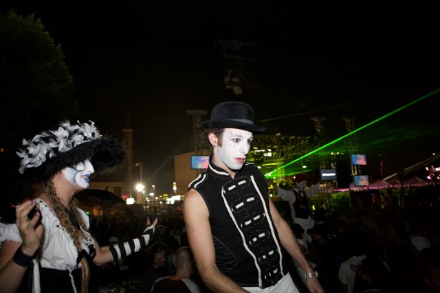 White and Black Costumed Duo