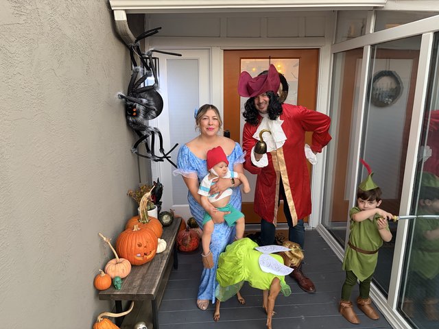 Family Peter Pan Halloween Costume on Front Porch