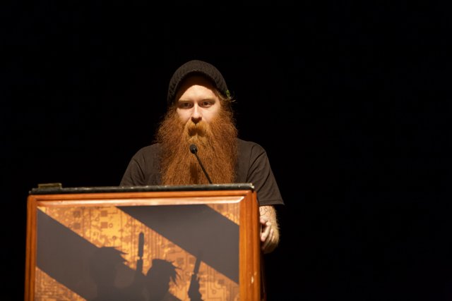Red Bearded Man Takes the Stage