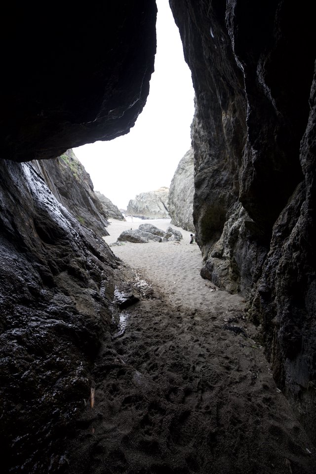 Looking Out Through a Sea Cave Opening to Beach