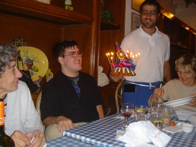 Birthday Celebration Surprise at Restaurant Table