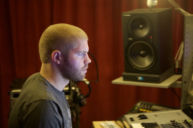 Morgan Page Mixing Music in Recording Studio