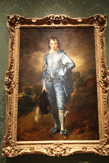 Portrait of a Young Man in Blue Clothes