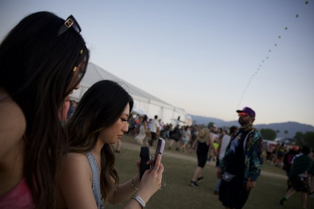 Candid Moments at Coachella 2024: Connected in the Crowd