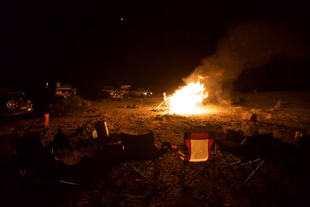 Nighttime Bonfire Camping with Chairs
