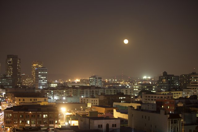 Illuminated Metropolis under a Full Moon