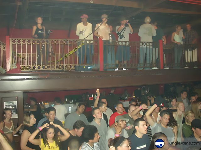 Nightclub Crowd with a Balcony View