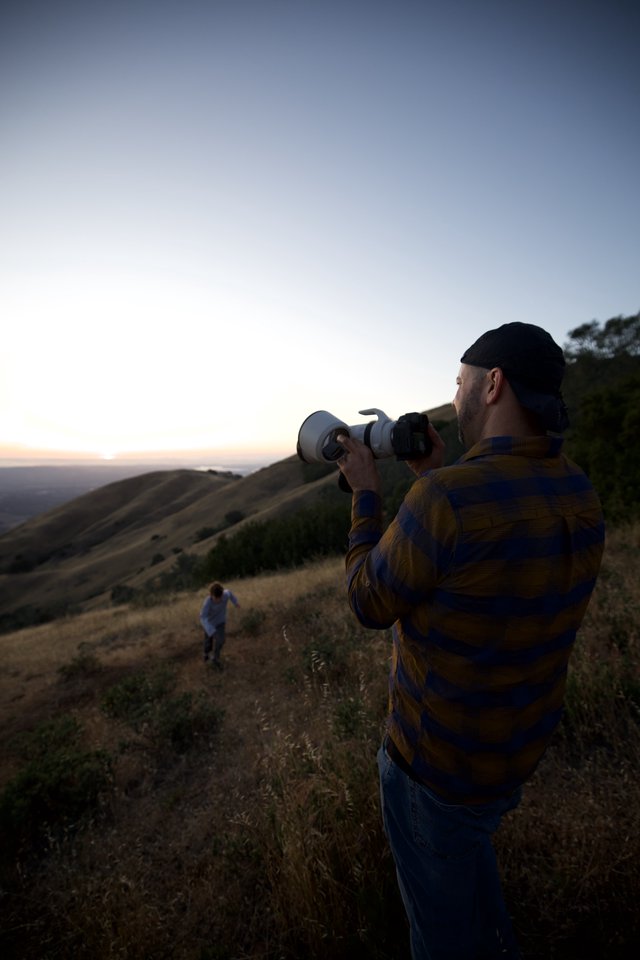 Photographer Captures Sunset Over Golden Hills at Dusk