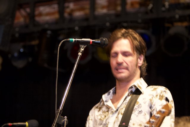 The Entertainer on Stage with his Guitar