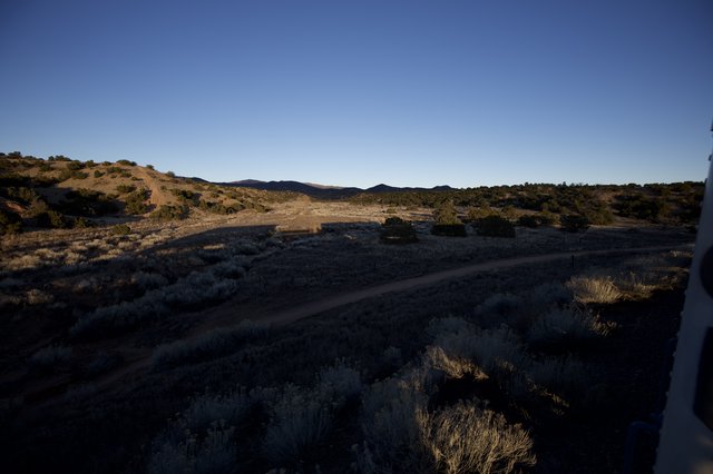 Desert Dirt Road at Dusk in Arid Southwest Landscape
