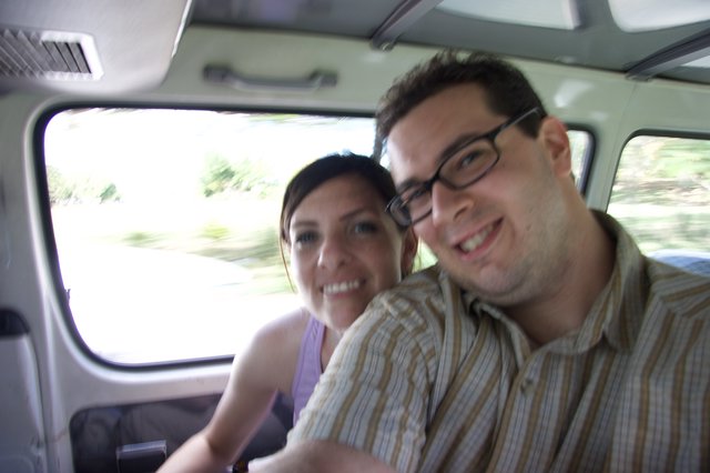 Couple Smiling Together During Van Ride in Fiji