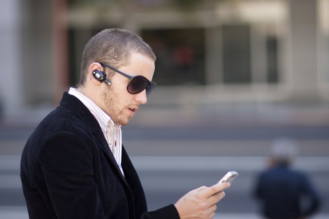 Stylish Men with Their Tech