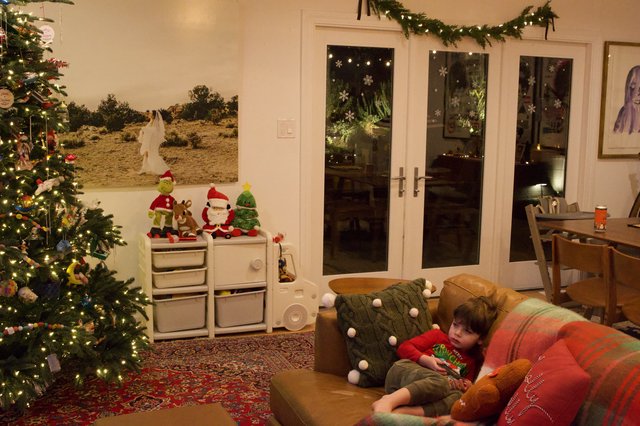 Cozy Christmas Eve Living Room with Child Relaxing