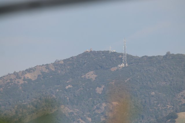 Communication Tower on Hazy Mountain Ridge