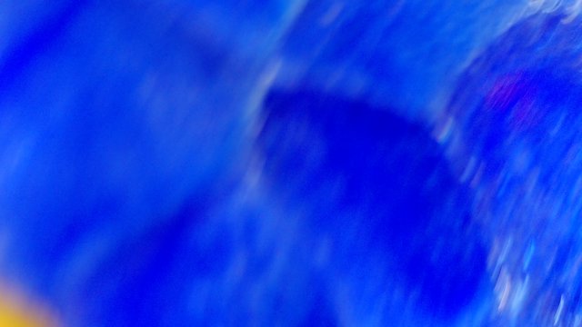 Electric Blue Vortex: Abstract Microscopic Swirling Patterns