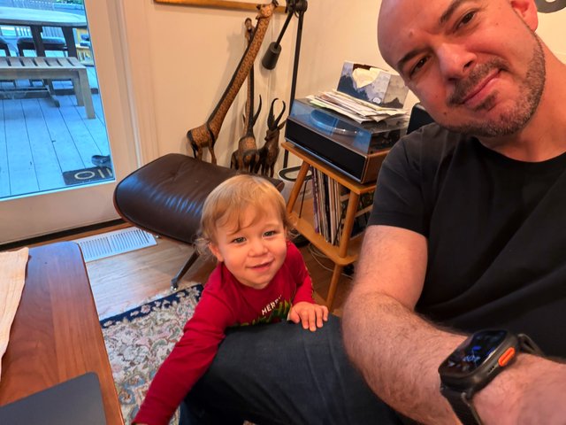 Father and Child Gaming Together at Home